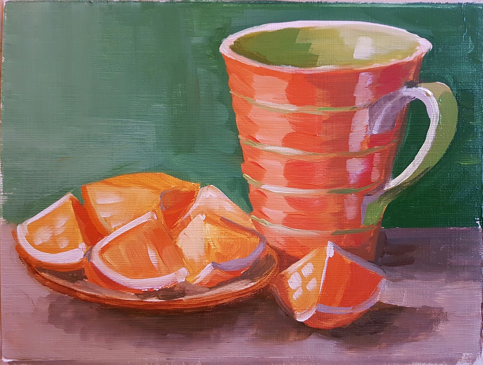 Oranges with mug